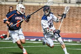  iSchool students hopeful of a new sports team. Above pictured Virginia V. Penn State in lacrosse game.
