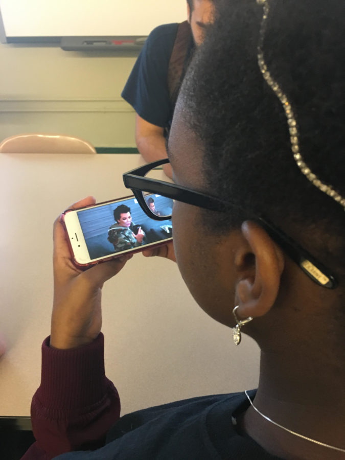 Kai Huntt, a sophomore at the NYC iSchool, watching a clip of Keeping Up With the Kardashians during advisory. 