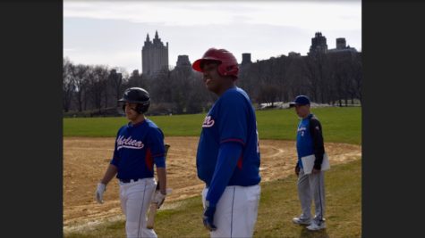 Junior Robert Rodriguez, Captain Christian Wilson, and Coach Joe Munoz at a game.
