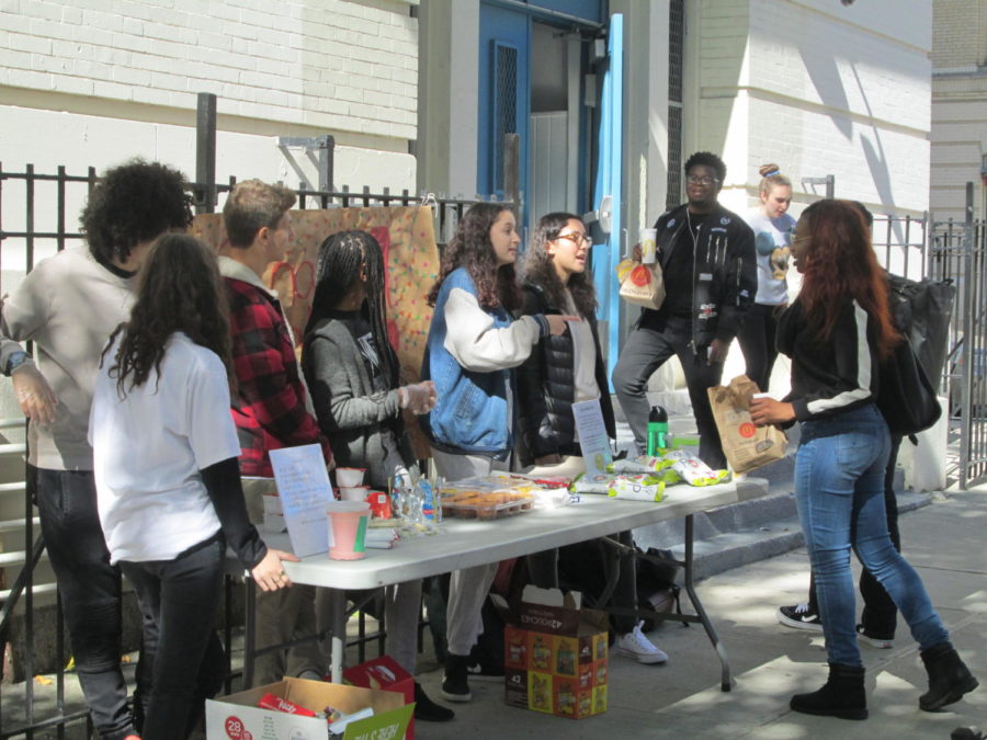 A group of iCare members working at the snack sale, during lunch, to raise money for Texas and Mexico.