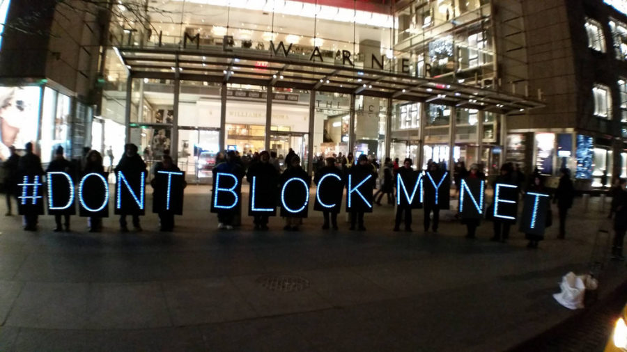 Reporters of the FCCs repeal gathered outside the Time Warner Center in NYC. 
Source: https://www.flickr.com/photos/backbone_campaign/16534114150