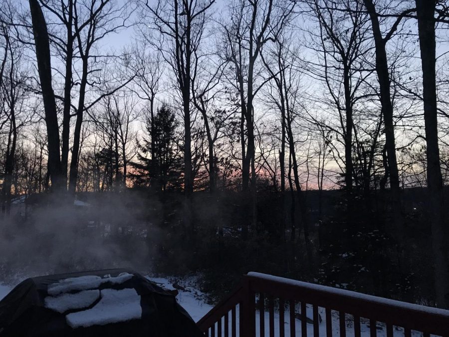 A+picture+of+sunset+during+the+quiet+times+of+quarantine.++The+steam+comes+from+the+mix+of+the+snow+with+the+heat+from+the+air.