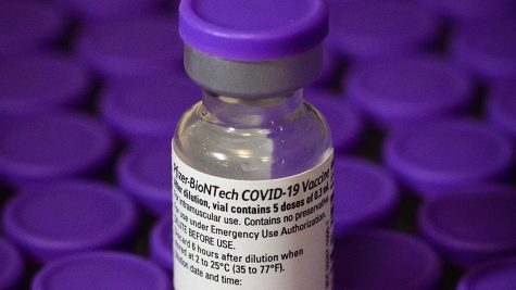 STRATFORD, ENGLAND - DECEMBER 15: Vials of the Pfizer/BioNTech Covid-19 vaccine are seen during a vaccination clinic at the Sir Ludwig Guttmann Health and Wellbeing Centre on December 15, 2020 in Stratford, England. After rolling out the vaccine to dozens of hub hospitals last week, the NHS is now enlisting several hundred primary care practices in its covid-19 vaccination campaign. (Photo by Leon Neal/Getty Images)