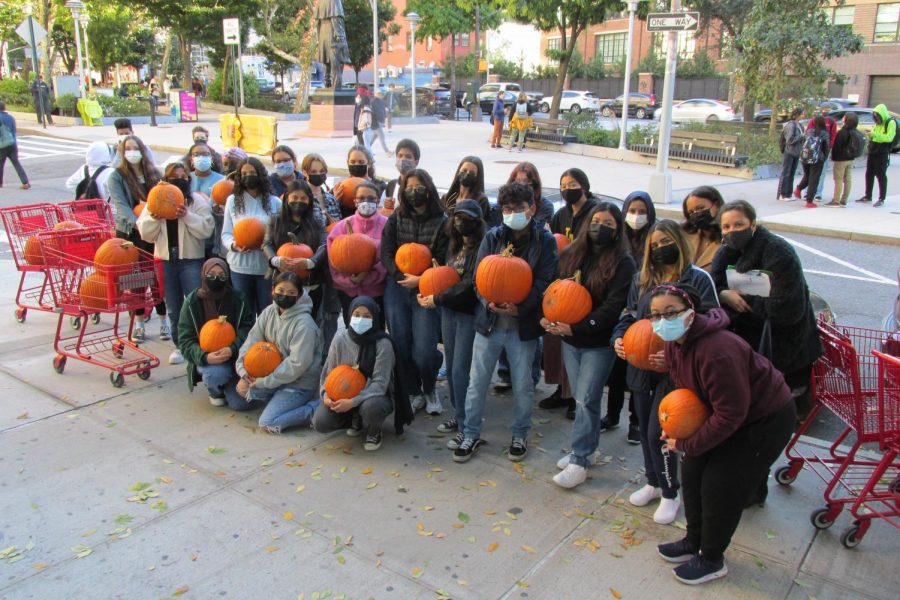iCare carrying the pumpkins for the pumpkin decorating competition (10/19/21)