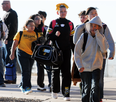 Image of children leaving school in distress. 