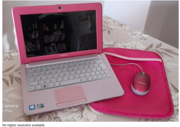 A pink computer. A different pink desktop computer also appears in game. This image belongs to https://commons.wikimedia.org/wiki/ File:Sony_Vaio_W_Pink.png and the author is marked as Ju7777.